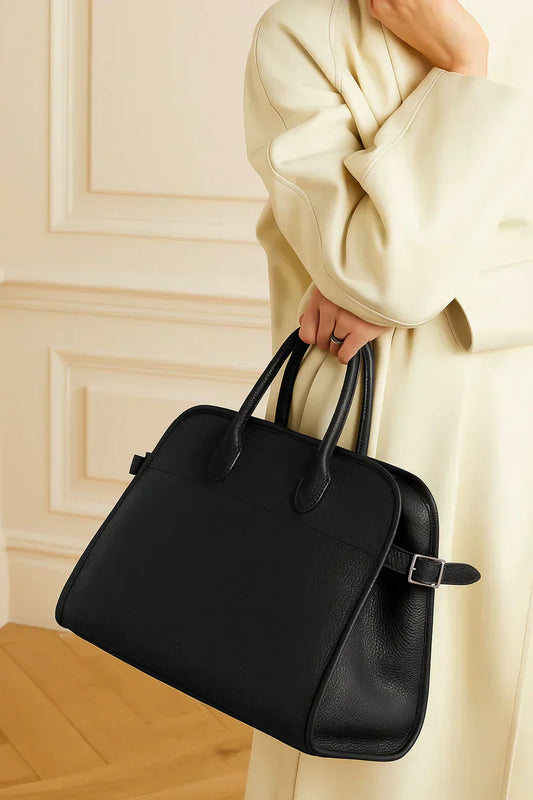 “Margaux-style structured leather handbag with a quiet luxury look, showcasing premium craftsmanship and elegant minimalist design.”