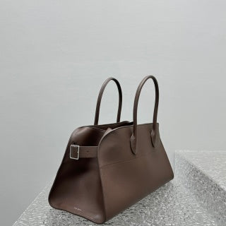 Black Margaux-style structured top handle bag shown to compare sizes 10, 12, 15, and 17